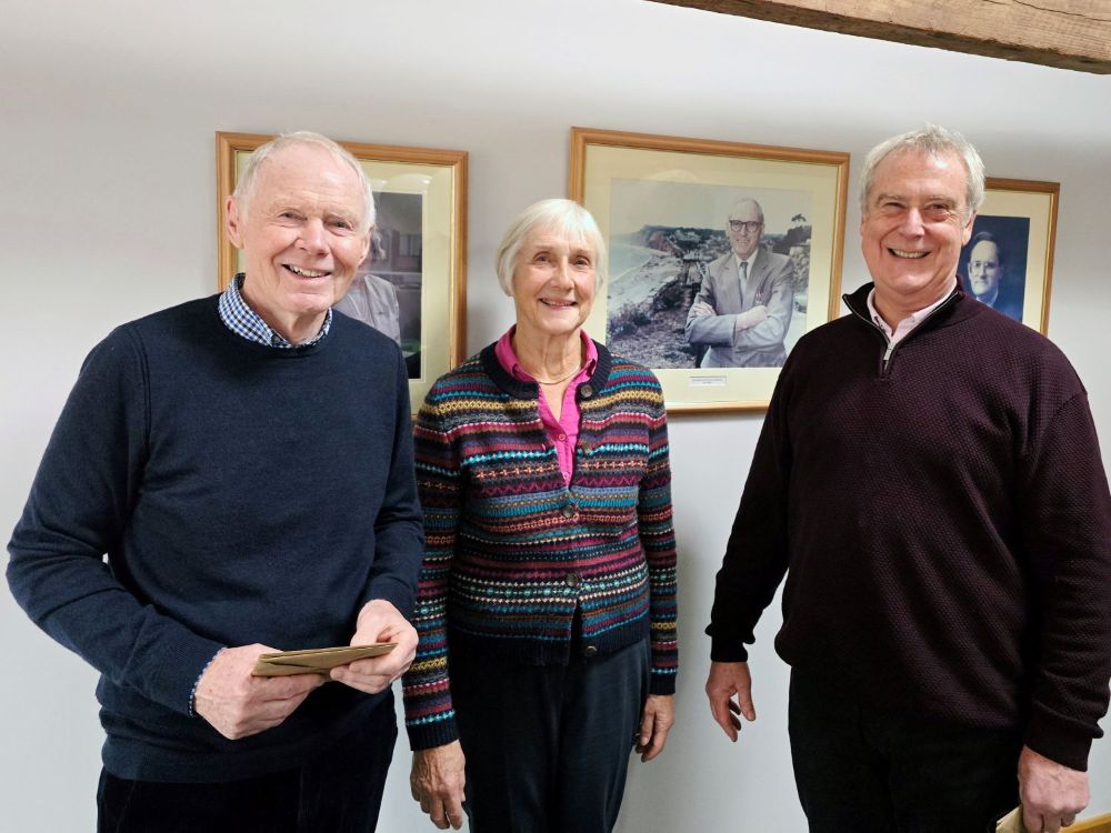 Photo of three retiring trustees